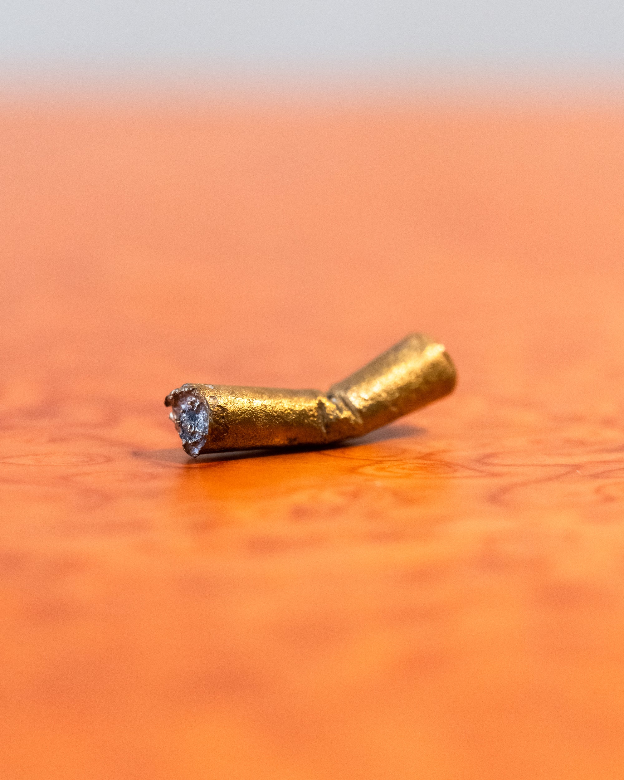 Bronze Cigarette Butt Sculpture